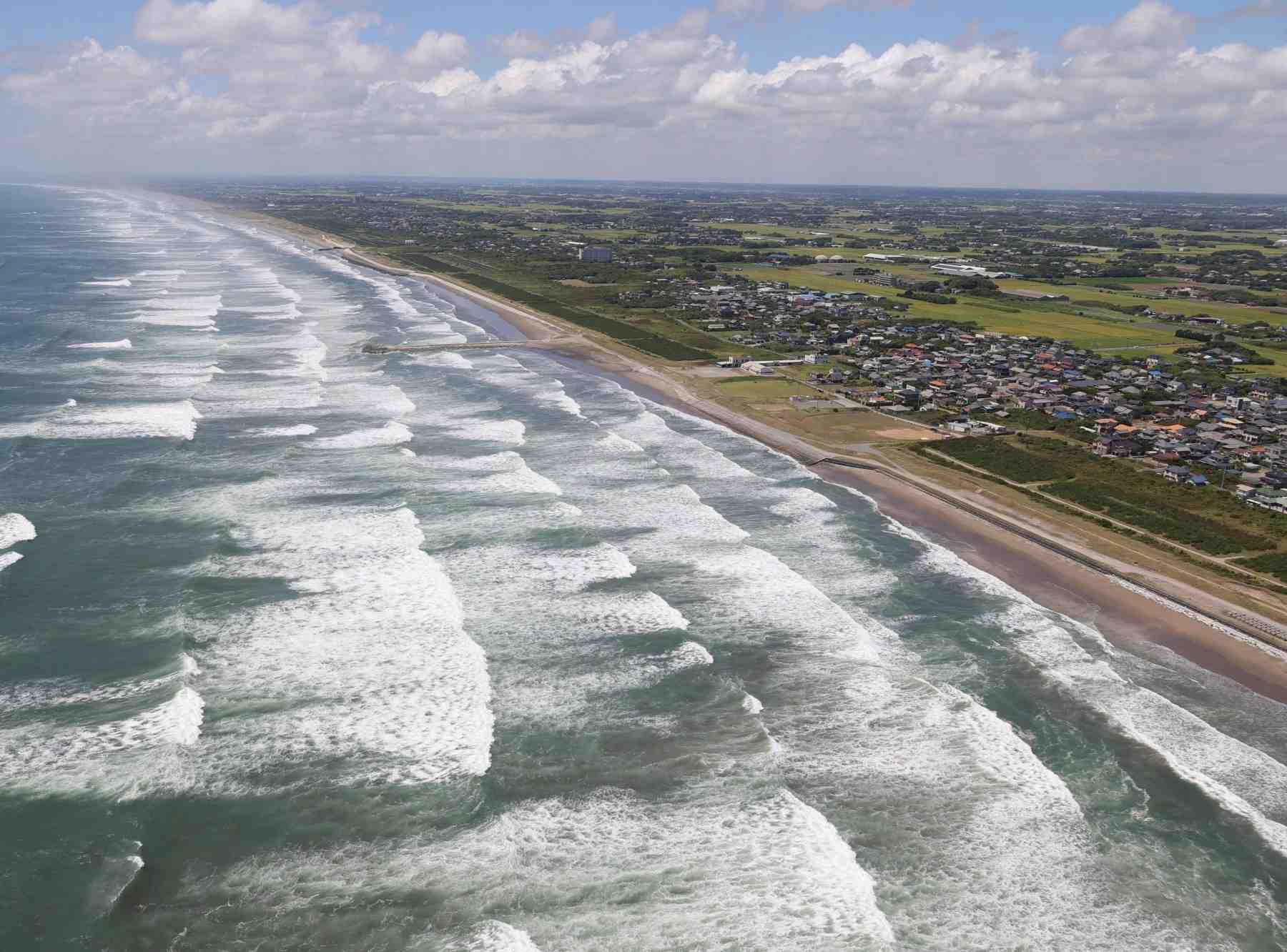 An aerial photograph captures white waves breaking along the Kujukuri Coast in Sosa City, Chiba Prefecture, Japan, following the magnitude 8.8 earthquake that struck Russia’s Kamchatka Peninsula on July 30, 2025. — The Yomiuri Shimbun/AP