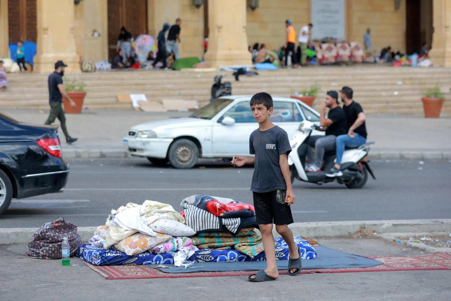 Internally displaced people are pictured in downtown Beirut on October 2, 2024. (Photo by IBRAHIM AMRO / AFP) Internally displaced people are pictured in downtown Beirut on October 2, 2024. (Photo by IBRAHIM AMRO / AFP)