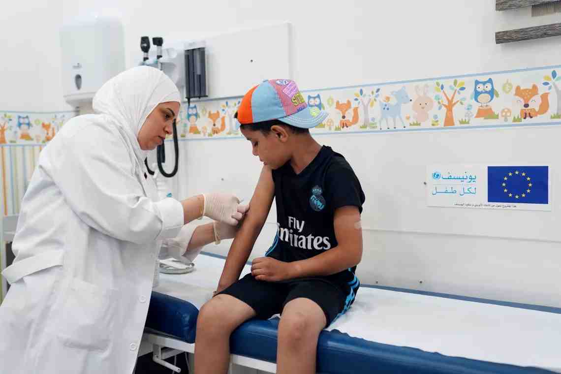 A child receiving a vaccine. (Image Credit: IFRC)