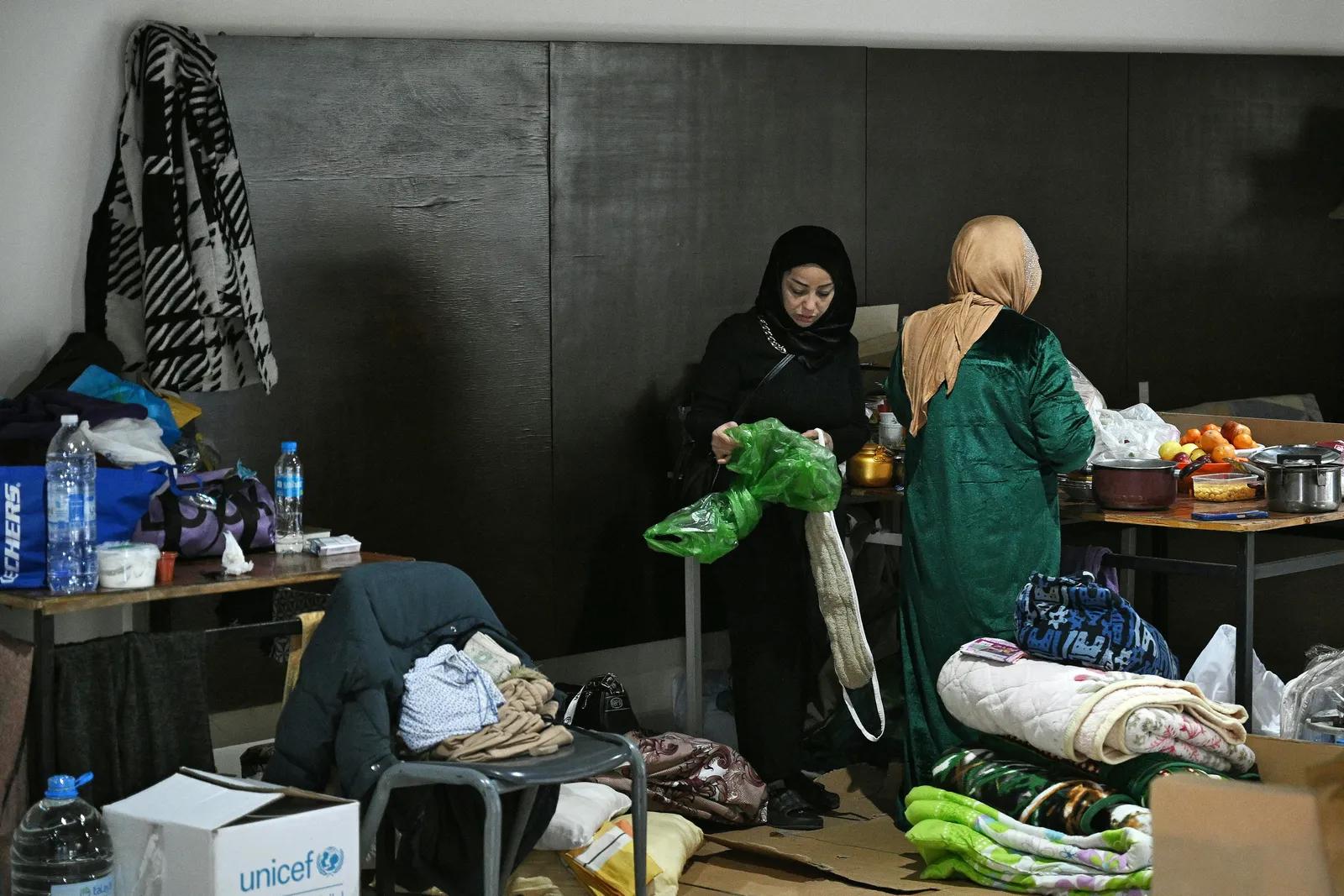For most displaced families, aid delivered by NGOs constitutes an essential lifeline. (Photo by Joseph EID / AFP via Getty Images) For most displaced families, aid delivered by NGOs constitutes an essential lifeline. (Photo by Joseph EID / AFP via Getty Images)