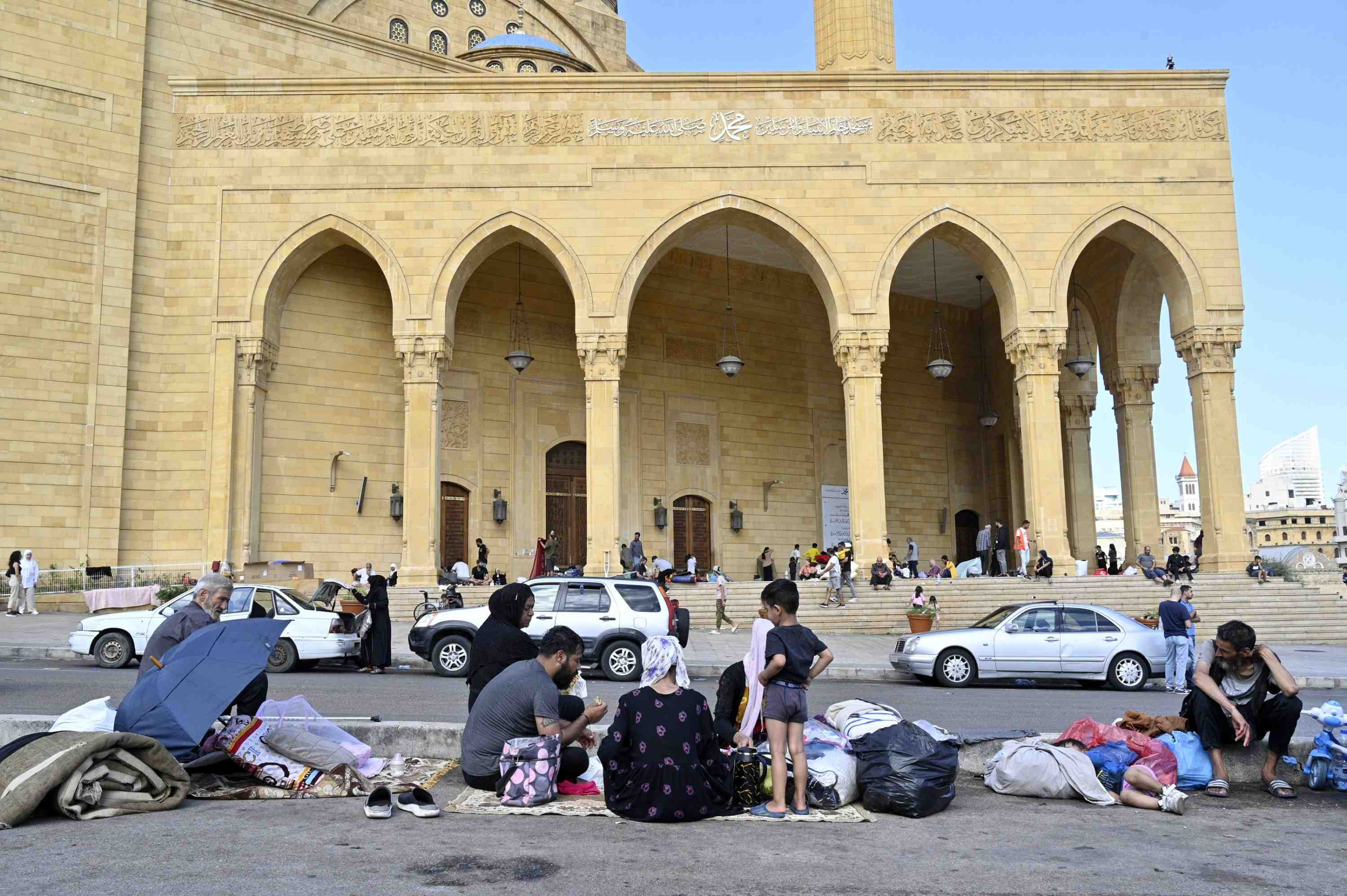People displaced amid Israeli military strikes in Lebanon gather on a street in Beirut, Lebanon, Oct. 1, 2024. (EPA Photo)