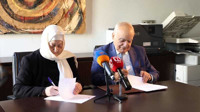 Mrs. Bahia Hariri and Minister Ghassan Salame at the signing ceremony
