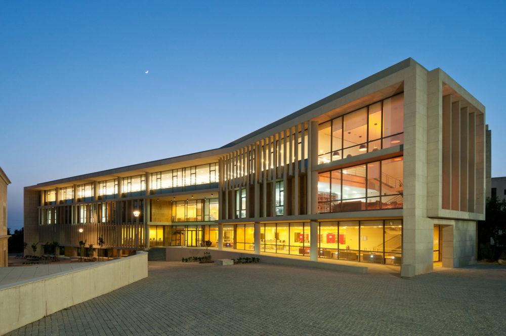Modern university building at the University of Balamand in Lebanon, illuminated at dusk. Modern university building at the University of Balamand in Lebanon, illuminated at dusk.