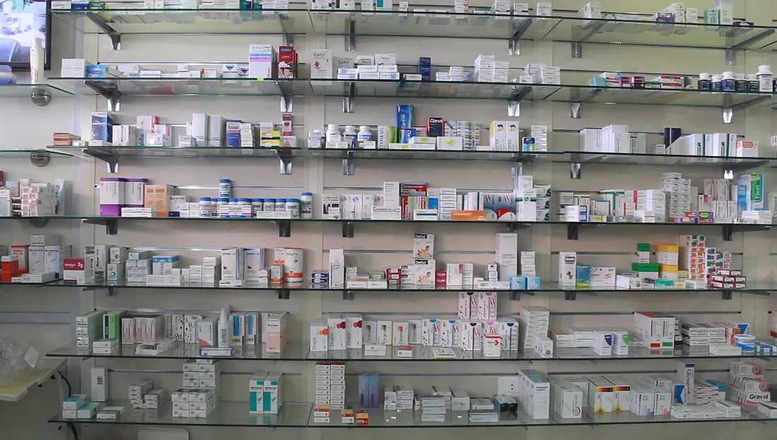 Shelves of medicines in a pharmacy — Photo by Maya Hamadeh