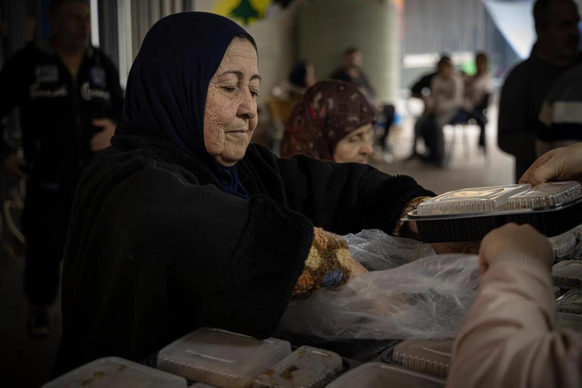 Food portions being distributed in one of Lebanon's shelters. (Image Credit: WFP) Food portions being distributed in one of Lebanon's shelters. (Image Credit: WFP)